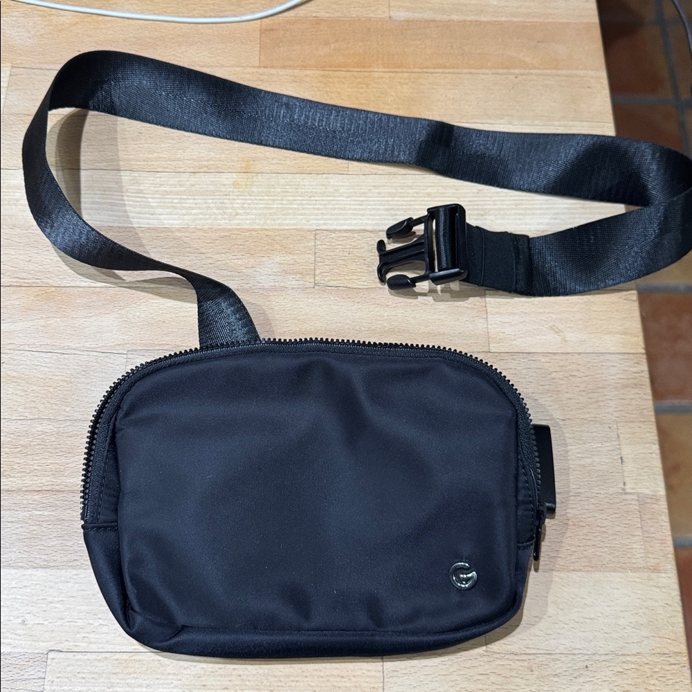 Glowmode black fanny pack bum bag shiny nylon sling bag used once or twice